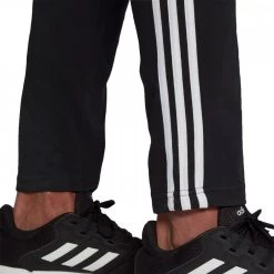 ADIDAS PANTALONI ESSENTIAL 3 STRIPES JERSEY Nero -Strada Moda adidas gk8995 pantaloni 3s jersey sport style uomo 044264401 blk 5